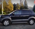 Черный Хендай Туксон, объемом двигателя 2 л и пробегом 230 тыс. км за 8600 $, фото 4 на Automoto.ua