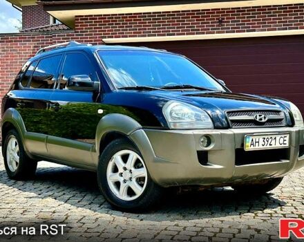 Черный Хендай Туксон, объемом двигателя 2 л и пробегом 212 тыс. км за 9000 $, фото 10 на Automoto.ua