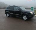 Чорний Хендай Туксон, об'ємом двигуна 2 л та пробігом 260 тис. км за 8450 $, фото 1 на Automoto.ua
