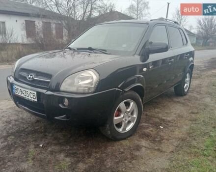 Черный Хендай Туксон, объемом двигателя 1.99 л и пробегом 235 тыс. км за 9000 $, фото 2 на Automoto.ua