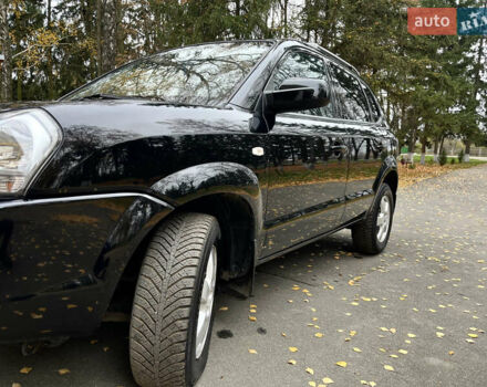 Черный Хендай Туксон, объемом двигателя 1.98 л и пробегом 99 тыс. км за 8999 $, фото 7 на Automoto.ua