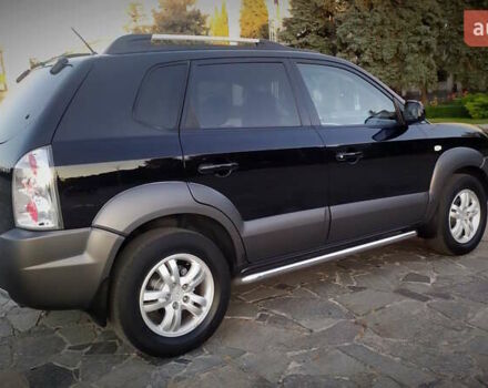 Черный Хендай Туксон, объемом двигателя 2 л и пробегом 230 тыс. км за 8600 $, фото 121 на Automoto.ua