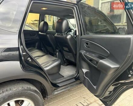 Черный Хендай Туксон, объемом двигателя 1.98 л и пробегом 147 тыс. км за 8000 $, фото 16 на Automoto.ua