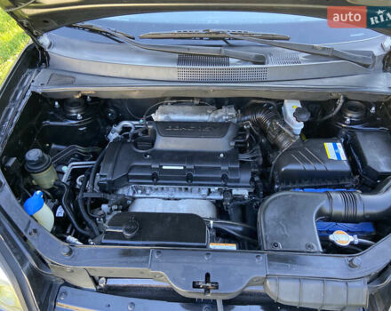 Черный Хендай Туксон, объемом двигателя 1.98 л и пробегом 197 тыс. км за 8000 $, фото 46 на Automoto.ua