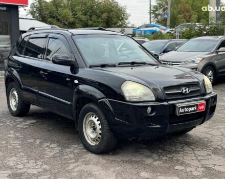 Черный Хендай Туксон, объемом двигателя 2 л и пробегом 177 тыс. км за 8940 $, фото 2 на Automoto.ua