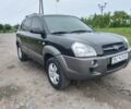 Черный Хендай Туксон, объемом двигателя 2 л и пробегом 160 тыс. км за 7600 $, фото 2 на Automoto.ua