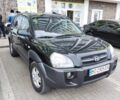 Черный Хендай Туксон, объемом двигателя 2 л и пробегом 250 тыс. км за 7900 $, фото 6 на Automoto.ua