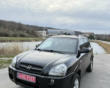 Черный Хендай Туксон, объемом двигателя 1.98 л и пробегом 159 тыс. км за 7600 $, фото 5 на Automoto.ua