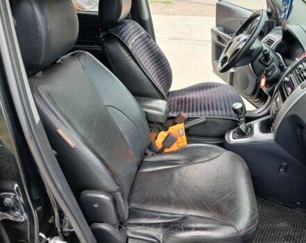 Чорний Хендай Туксон, об'ємом двигуна 2 л та пробігом 235 тис. км за 8000 $, фото 6 на Automoto.ua