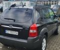 Черный Хендай Туксон, объемом двигателя 2 л и пробегом 230 тыс. км за 7700 $, фото 1 на Automoto.ua