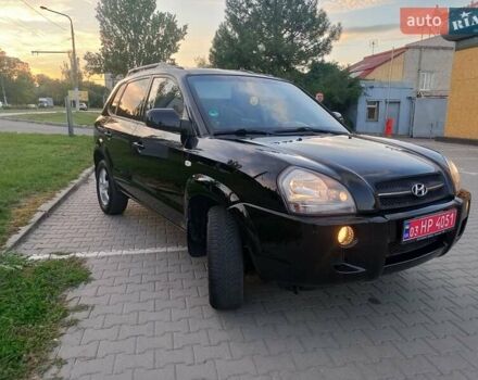 Чорний Хендай Туксон, об'ємом двигуна 1.98 л та пробігом 192 тис. км за 7950 $, фото 1 на Automoto.ua
