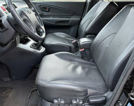 Черный Хендай Туксон, объемом двигателя 1.98 л и пробегом 159 тыс. км за 7600 $, фото 37 на Automoto.ua