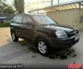 Черный Хендай Туксон, объемом двигателя 2 л и пробегом 200 тыс. км за 7400 $, фото 2 на Automoto.ua