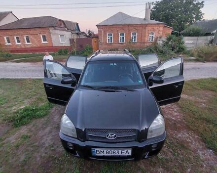 Черный Хендай Туксон, объемом двигателя 1.98 л и пробегом 200 тыс. км за 7100 $, фото 3 на Automoto.ua