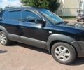 Чорний Хендай Туксон, об'ємом двигуна 2 л та пробігом 261 тис. км за 7500 $, фото 2 на Automoto.ua