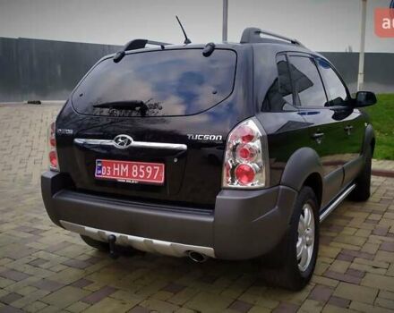 Чорний Хендай Туксон, об'ємом двигуна 2 л та пробігом 229 тис. км за 8600 $, фото 44 на Automoto.ua