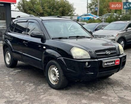 Черный Хендай Туксон, объемом двигателя 2 л и пробегом 177 тыс. км за 8940 $, фото 3 на Automoto.ua