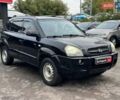 Черный Хендай Туксон, объемом двигателя 2 л и пробегом 177 тыс. км за 8940 $, фото 3 на Automoto.ua