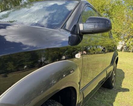 Чорний Хендай Туксон, об'ємом двигуна 2 л та пробігом 186 тис. км за 8099 $, фото 1 на Automoto.ua