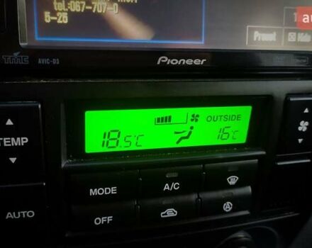 Черный Хендай Туксон, объемом двигателя 2 л и пробегом 230 тыс. км за 8600 $, фото 208 на Automoto.ua