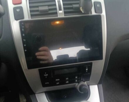 Черный Хендай Туксон, объемом двигателя 2 л и пробегом 200 тыс. км за 8300 $, фото 6 на Automoto.ua