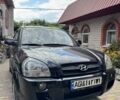 Чорний Хендай Туксон, об'ємом двигуна 2 л та пробігом 275 тис. км за 9500 $, фото 1 на Automoto.ua