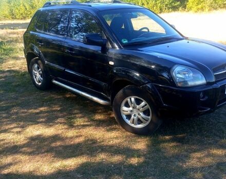 Черный Хендай Туксон, объемом двигателя 2 л и пробегом 236 тыс. км за 8300 $, фото 4 на Automoto.ua