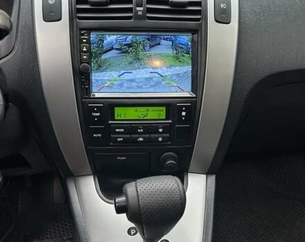 Черный Хендай Туксон, объемом двигателя 1.98 л и пробегом 147 тыс. км за 8000 $, фото 29 на Automoto.ua