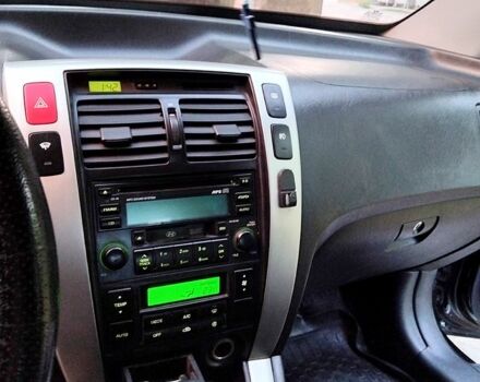 Черный Хендай Туксон, объемом двигателя 2 л и пробегом 270 тыс. км за 7400 $, фото 7 на Automoto.ua