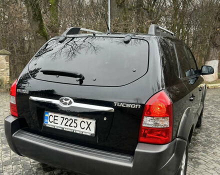 Чорний Хендай Туксон, об'ємом двигуна 1.98 л та пробігом 155 тис. км за 8750 $, фото 3 на Automoto.ua