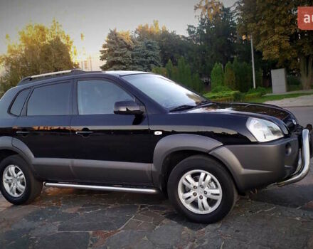 Черный Хендай Туксон, объемом двигателя 2 л и пробегом 230 тыс. км за 8600 $, фото 115 на Automoto.ua