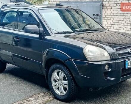 Чорний Хендай Туксон, об'ємом двигуна 2 л та пробігом 308 тис. км за 7555 $, фото 1 на Automoto.ua