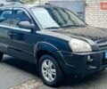 Чорний Хендай Туксон, об'ємом двигуна 2 л та пробігом 308 тис. км за 7555 $, фото 1 на Automoto.ua