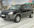 Черный Хендай Туксон, объемом двигателя 1.98 л и пробегом 228 тыс. км за 7200 $, фото 1 на Automoto.ua