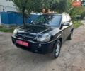 Черный Хендай Туксон, объемом двигателя 2 л и пробегом 219 тыс. км за 7990 $, фото 25 на Automoto.ua