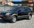 Черный Хендай Туксон, объемом двигателя 2 л и пробегом 201 тыс. км за 8500 $, фото 1 на Automoto.ua
