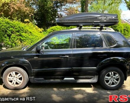 Черный Хендай Туксон, объемом двигателя 2 л и пробегом 175 тыс. км за 8900 $, фото 12 на Automoto.ua