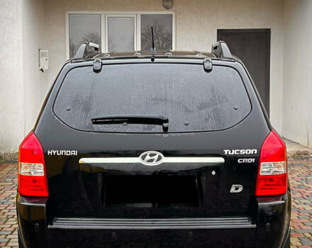 Черный Хендай Туксон, объемом двигателя 2 л и пробегом 151 тыс. км за 9100 $, фото 40 на Automoto.ua