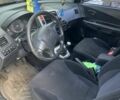 Черный Хендай Туксон, объемом двигателя 2 л и пробегом 270 тыс. км за 6000 $, фото 4 на Automoto.ua
