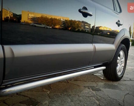 Черный Хендай Туксон, объемом двигателя 2 л и пробегом 230 тыс. км за 8600 $, фото 83 на Automoto.ua