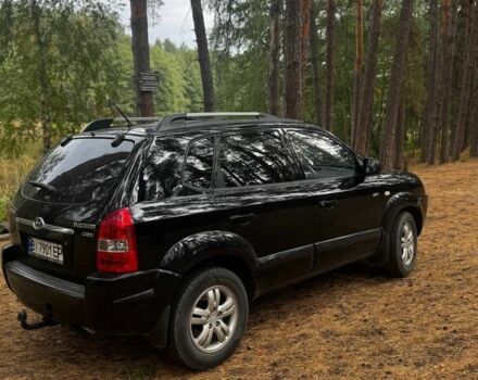 Черный Хендай Туксон, объемом двигателя 2 л и пробегом 240 тыс. км за 8800 $, фото 5 на Automoto.ua