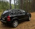 Черный Хендай Туксон, объемом двигателя 2 л и пробегом 240 тыс. км за 8800 $, фото 5 на Automoto.ua