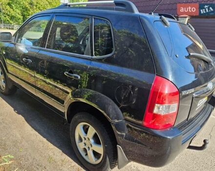 Чорний Хендай Туксон, об'ємом двигуна 2 л та пробігом 152 тис. км за 7950 $, фото 3 на Automoto.ua