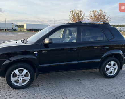 Черный Хендай Туксон, объемом двигателя 1.98 л и пробегом 243 тыс. км за 8500 $, фото 8 на Automoto.ua