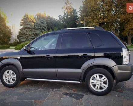Черный Хендай Туксон, объемом двигателя 2 л и пробегом 230 тыс. км за 8600 $, фото 102 на Automoto.ua