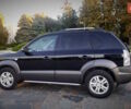 Черный Хендай Туксон, объемом двигателя 2 л и пробегом 230 тыс. км за 8600 $, фото 102 на Automoto.ua