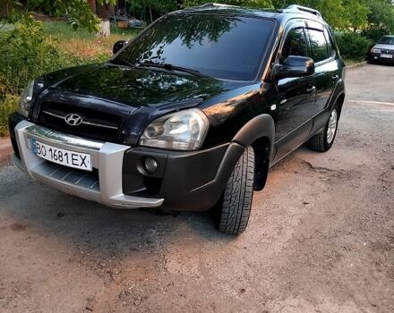 Черный Хендай Туксон, объемом двигателя 2 л и пробегом 270 тыс. км за 7400 $, фото 1 на Automoto.ua