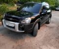 Черный Хендай Туксон, объемом двигателя 2 л и пробегом 270 тыс. км за 7400 $, фото 1 на Automoto.ua