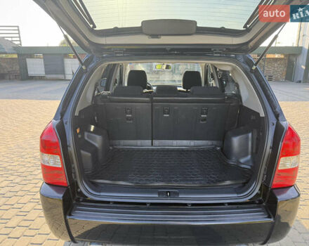 Черный Хендай Туксон, объемом двигателя 2 л и пробегом 270 тыс. км за 8200 $, фото 1 на Automoto.ua