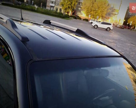 Черный Хендай Туксон, объемом двигателя 2 л и пробегом 230 тыс. км за 8600 $, фото 56 на Automoto.ua